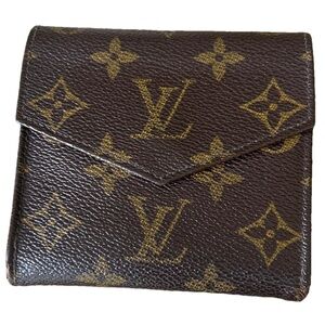 Louis Vuitton Brown Monogram Double Snap Wallet. Excellent condition.